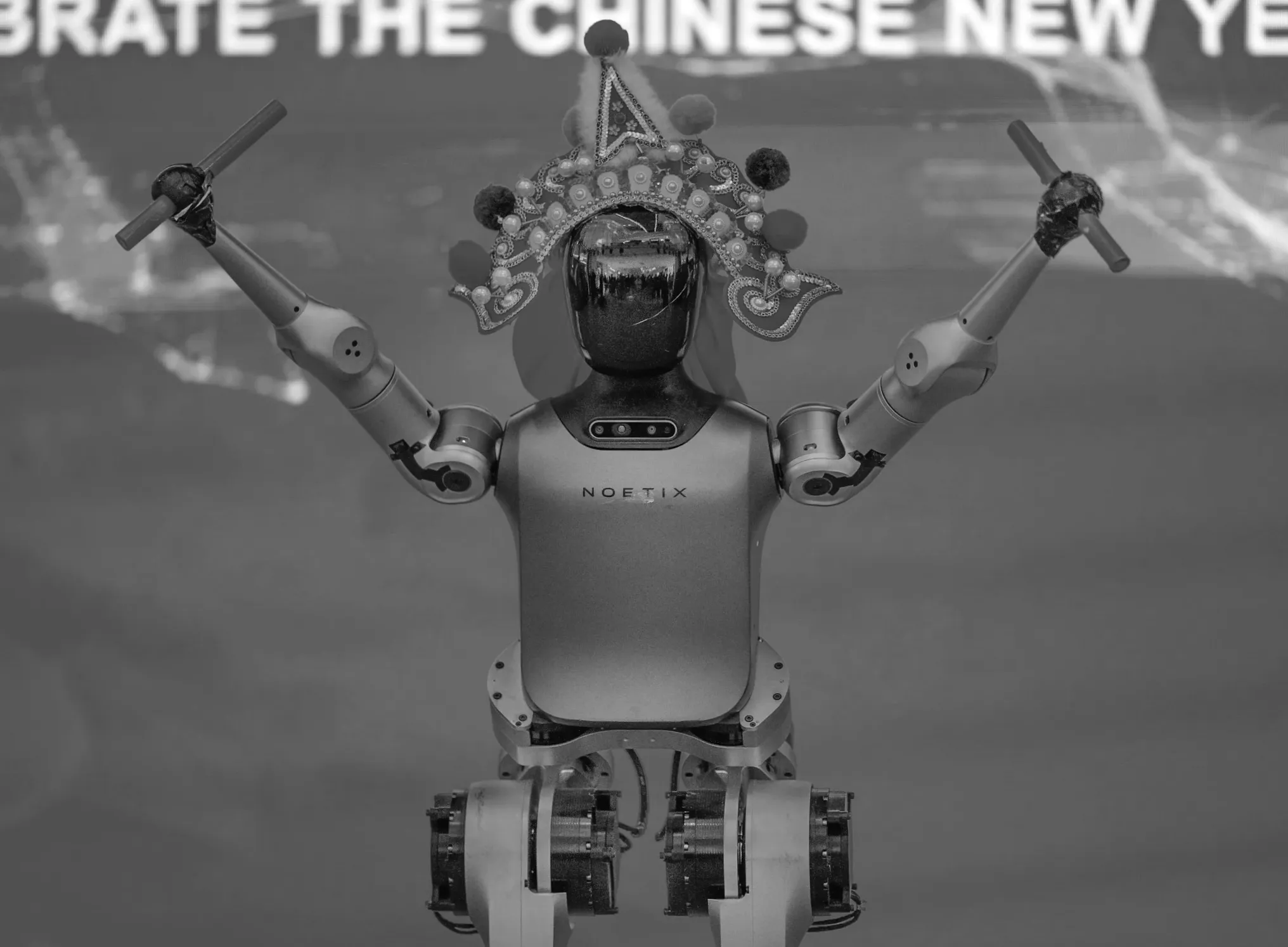 Люди та роботи готуються святкувати Лунний Новий рік в Китаї