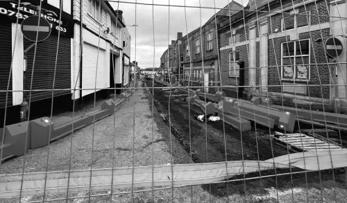 Відновлення містечка стоїть на місці через правовий спір